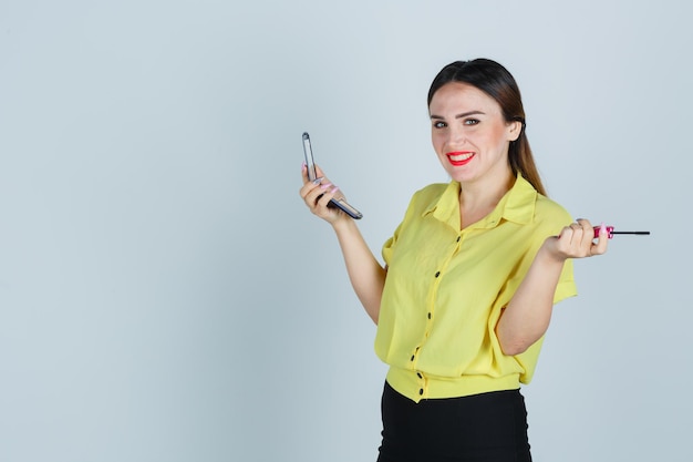 Expressive young lady posing in the studio