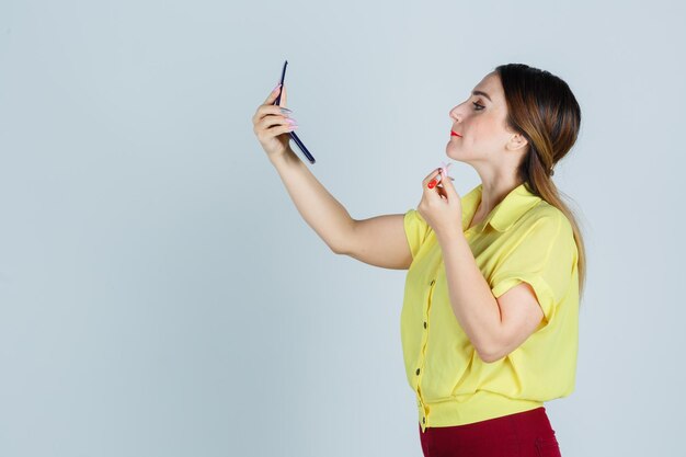 Expressive young lady posing in the studio