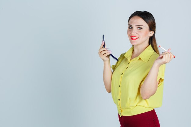 Expressive young lady posing in the studio