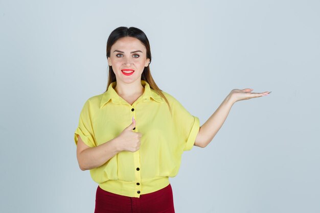 Expressive young lady posing in the studio