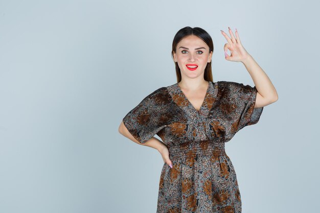 Expressive young lady posing in the studio