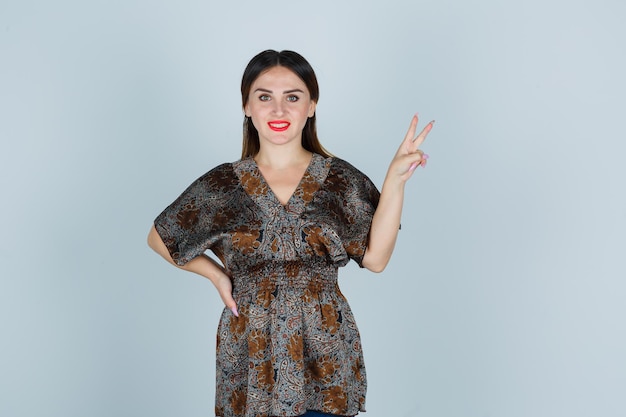 Expressive young lady posing in the studio