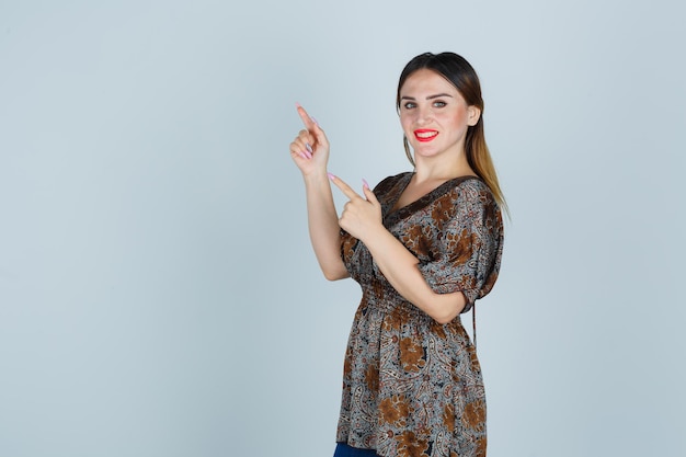 Expressive young lady posing in the studio