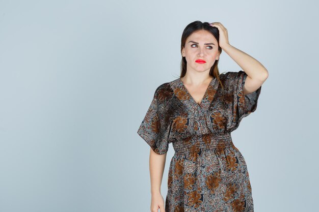 Expressive young lady posing in the studio