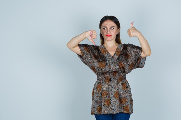 Expressive young lady posing in the studio