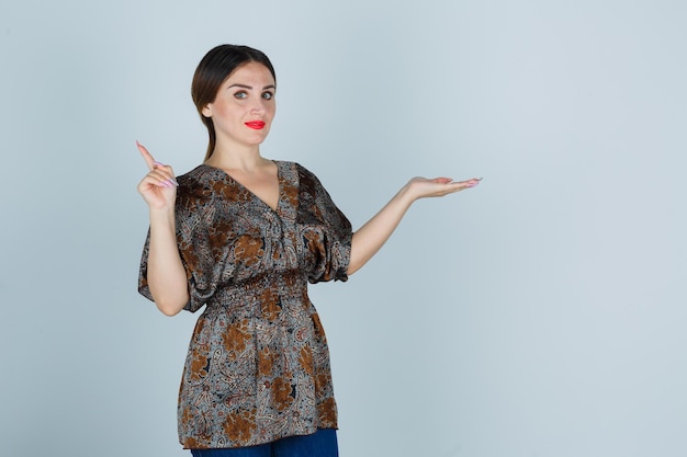 Expressive young lady posing in the studio