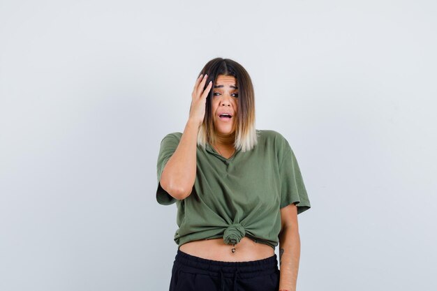 Expressive young lady posing in the studio