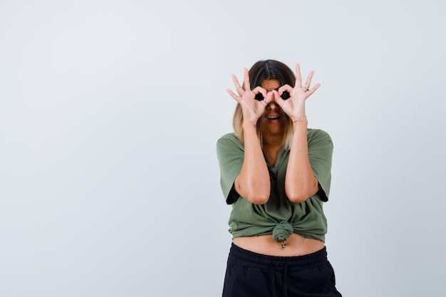 Expressive young lady posing in the studio