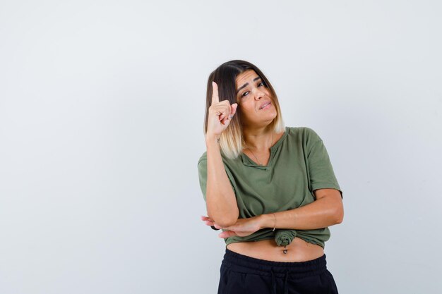 Expressive young lady posing in the studio