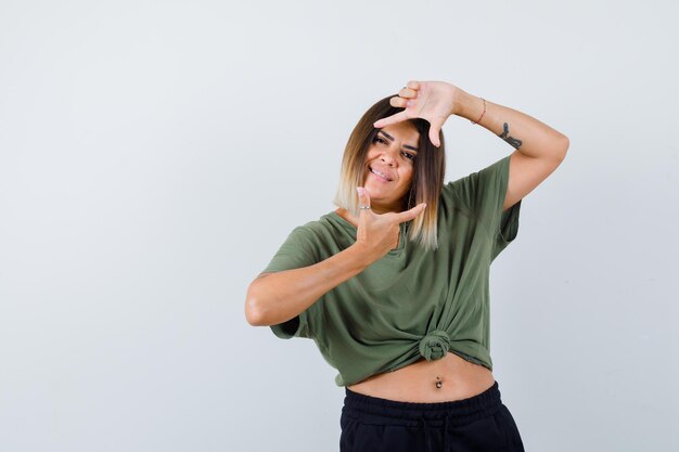 Expressive young lady posing in the studio