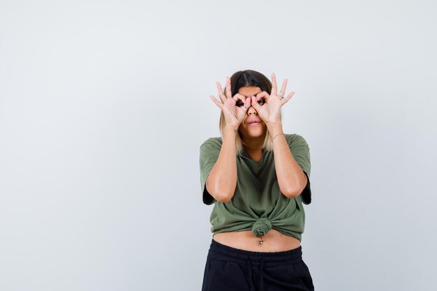 Expressive young lady posing in the studio