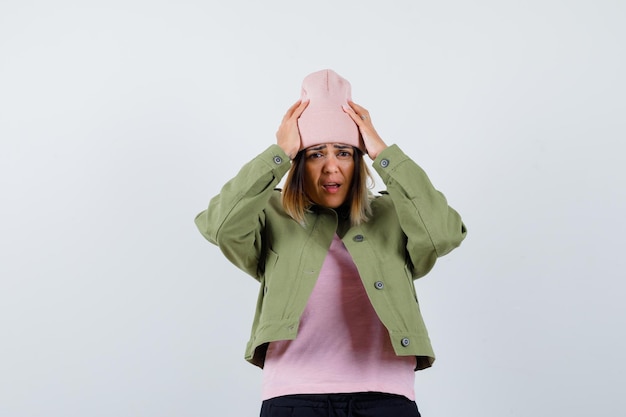 Expressive young lady posing in the studio