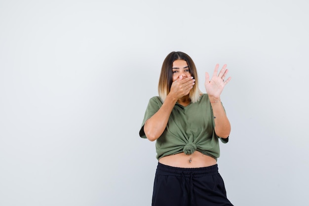 Expressive young lady posing in the studio