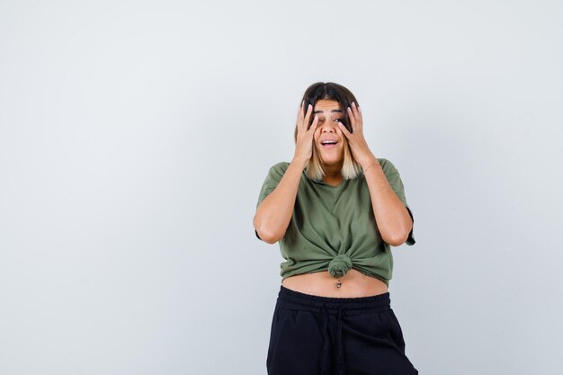 Expressive young lady posing in the studio