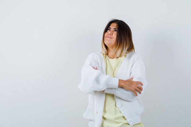 Expressive young lady posing in the studio