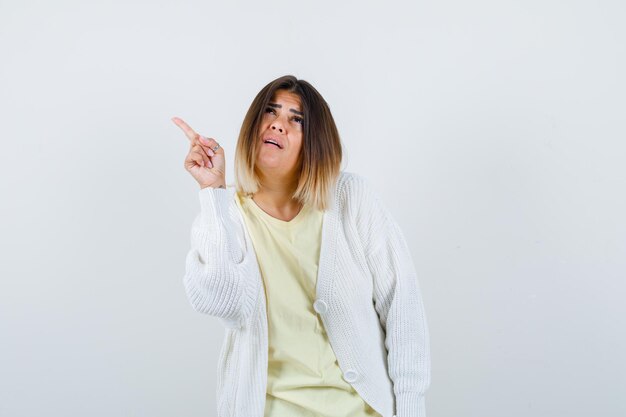 Expressive young lady posing in the studio