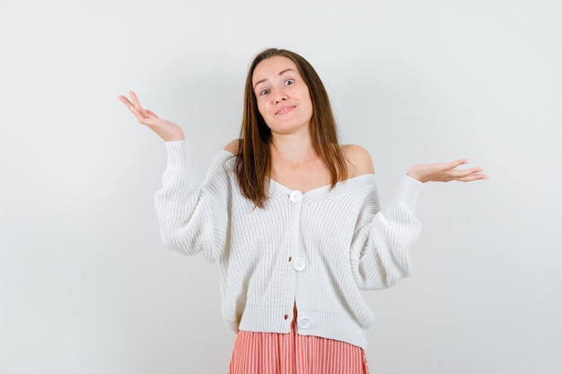 Expressive young lady posing in the studio