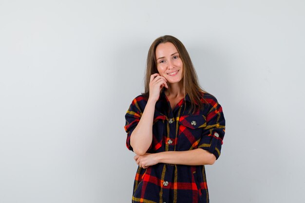 Expressive young lady posing in the studio