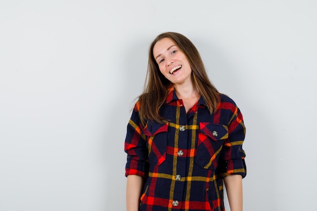 Expressive young lady posing in the studio