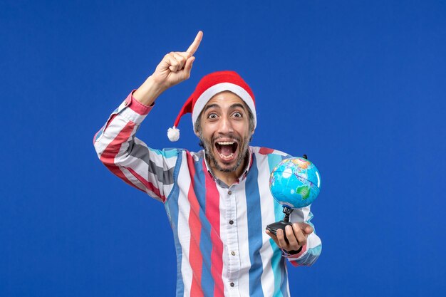 Free photo expressive young man posing for christmas