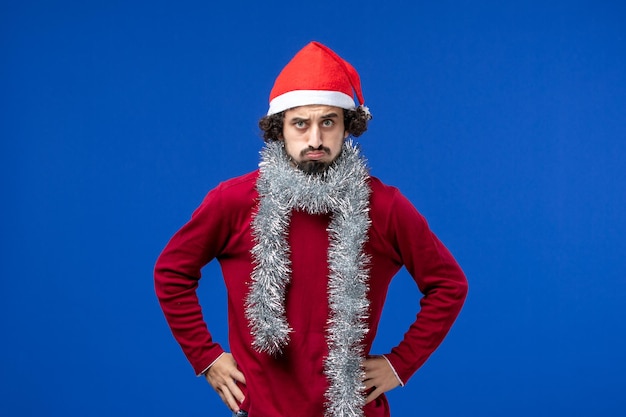 Free photo expressive young man posing for christmas