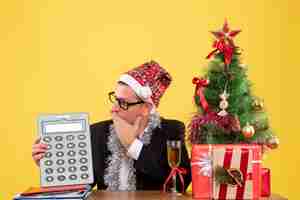 Free photo expressive young man posing for christmas