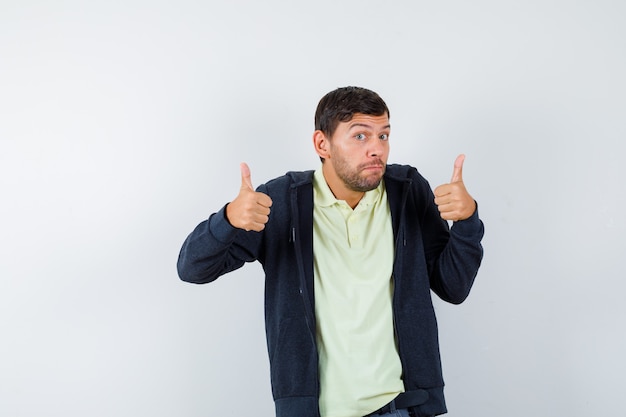 Expressive young man posing in the studio