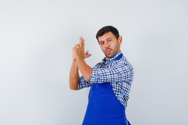 Expressive young man posing in the studio