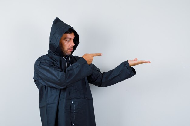 Expressive young man posing in the studio