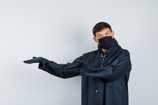 Expressive young man posing in the studio