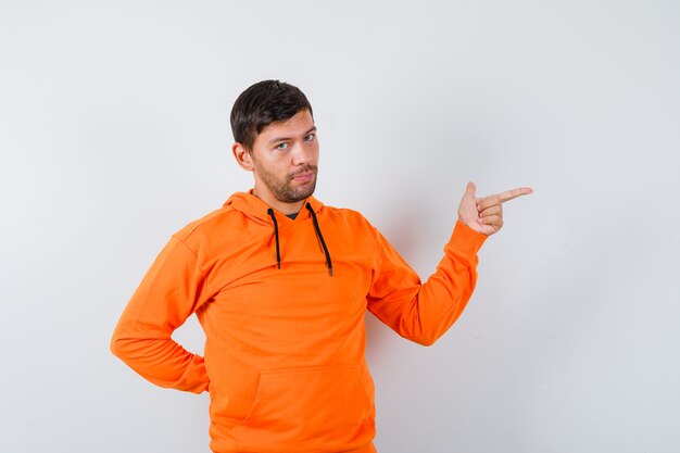 Expressive young man posing in the studio