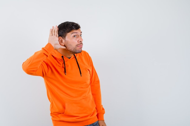 Expressive young man posing in the studio