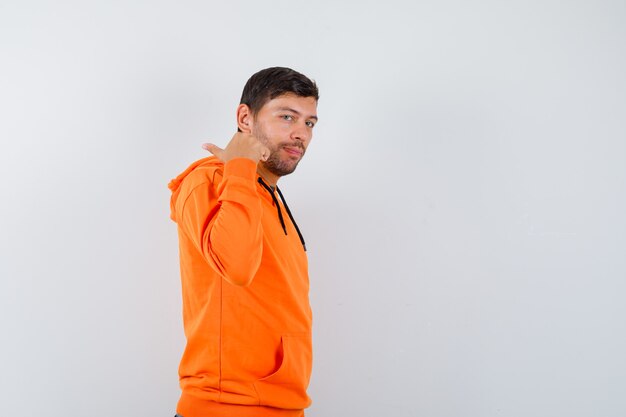 Expressive young man posing in the studio