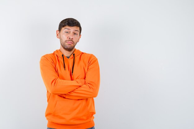 Expressive young man posing in the studio