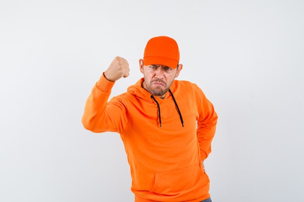 Expressive young man posing in the studio