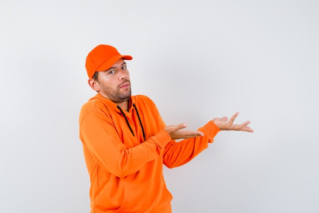 Expressive young man posing in the studio