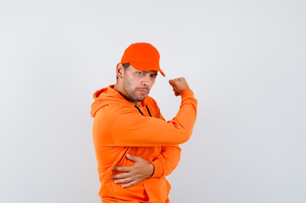 Free photo expressive young man posing in the studio