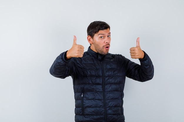 Free photo expressive young man posing in the studio