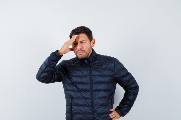 Expressive young man posing in the studio