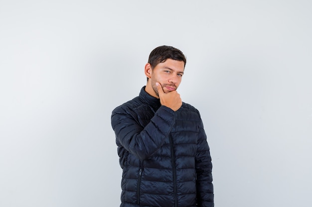 Expressive young man posing in the studio