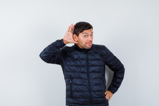 Expressive young man posing in the studio