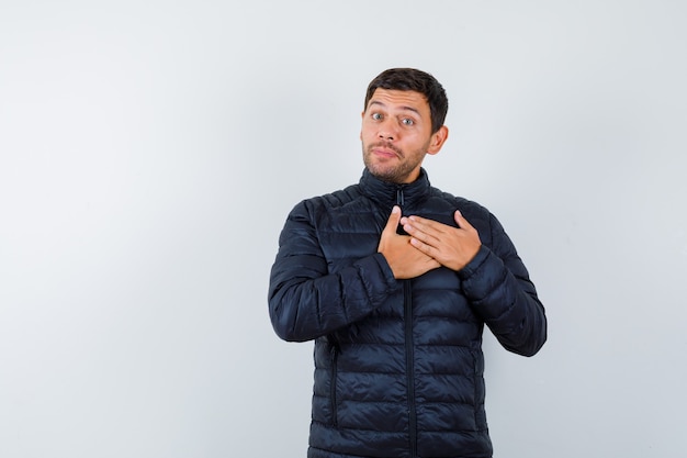 Expressive young man posing in the studio