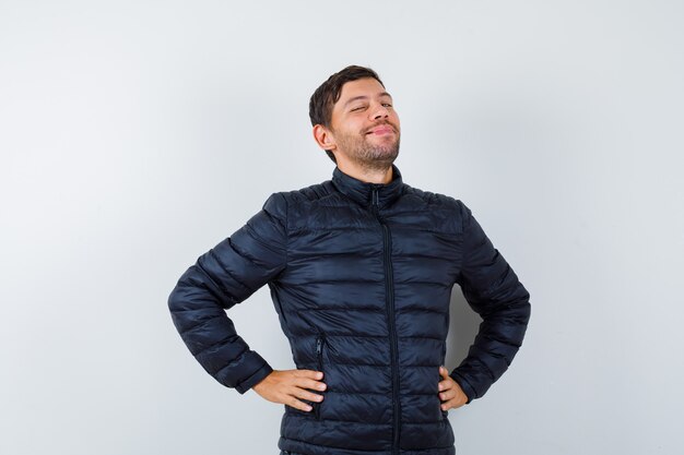 Expressive young man posing in the studio