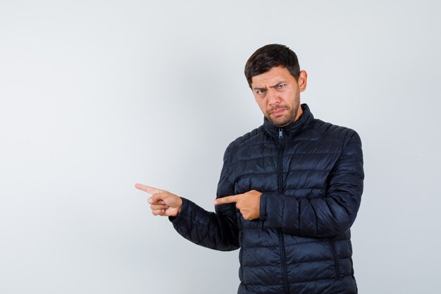 Expressive young man posing in the studio