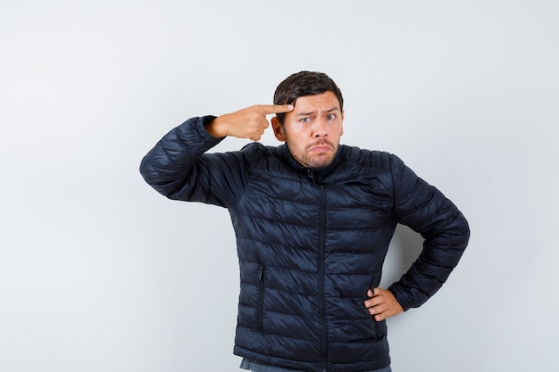 Expressive young man posing in the studio