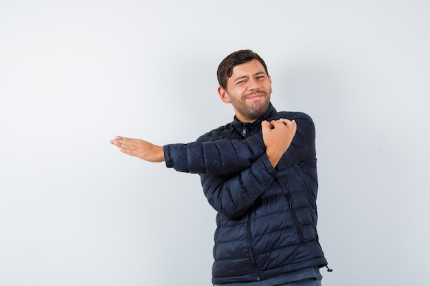 Expressive young man posing in the studio