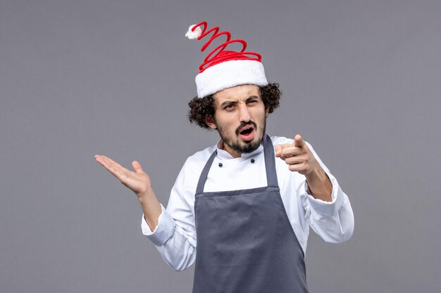 Expressive young man posing for winter holidays