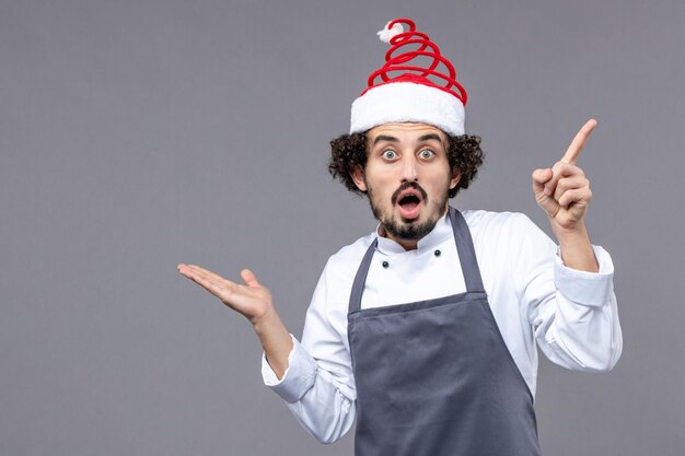 Expressive young man posing for winter holidays