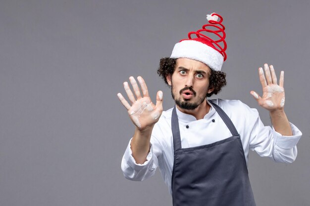 Expressive young man posing for winter holidays