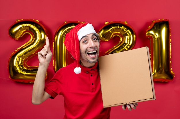 Expressive young man posing for winter holidays